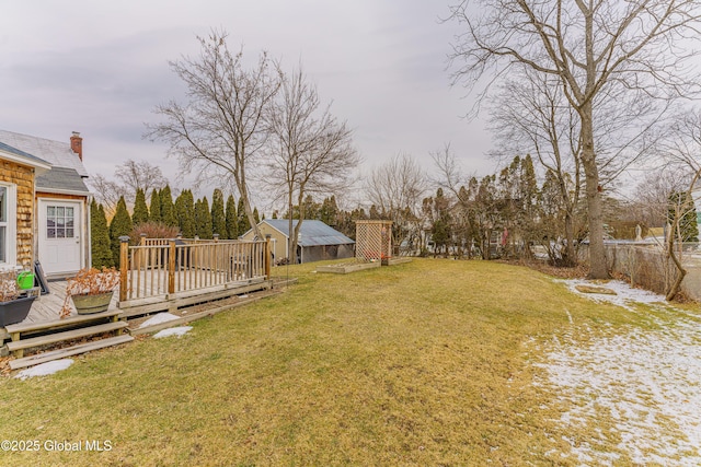 view of yard featuring a deck