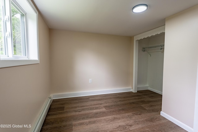 13 Camel Hill Rd, Brunswick, NY 12180 - unfurnished bedroom featuring dark wood finished floors, baseboards, and a closet