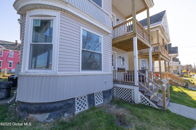 view of property exterior featuring a balcony