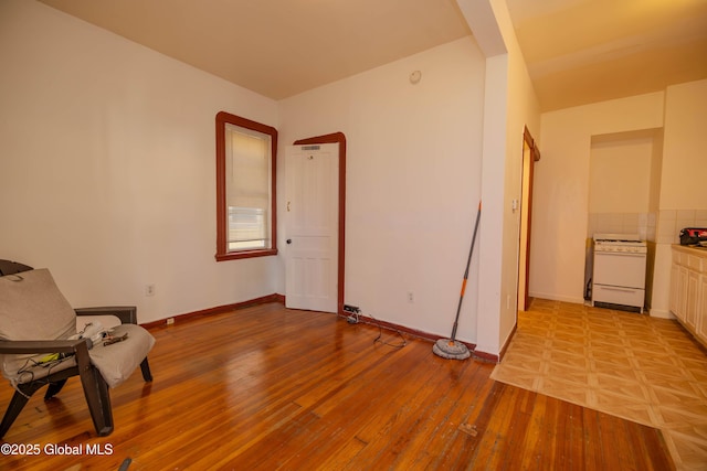 unfurnished room featuring light wood-type flooring