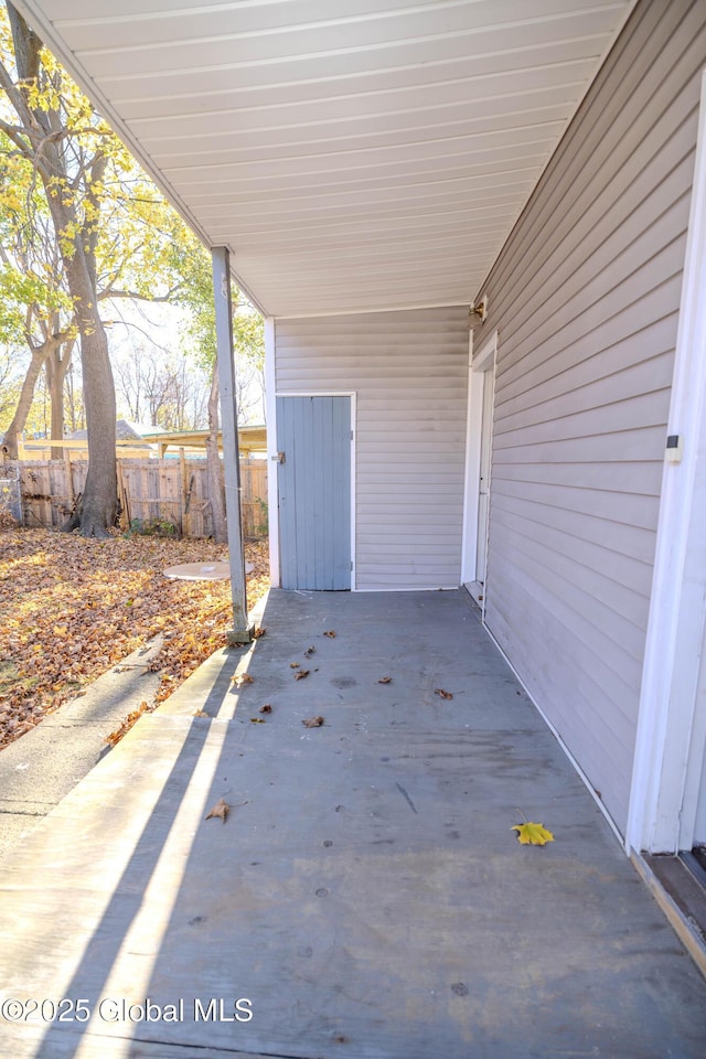 view of patio / terrace featuring a carport