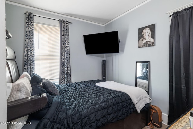 bedroom with ornamental molding