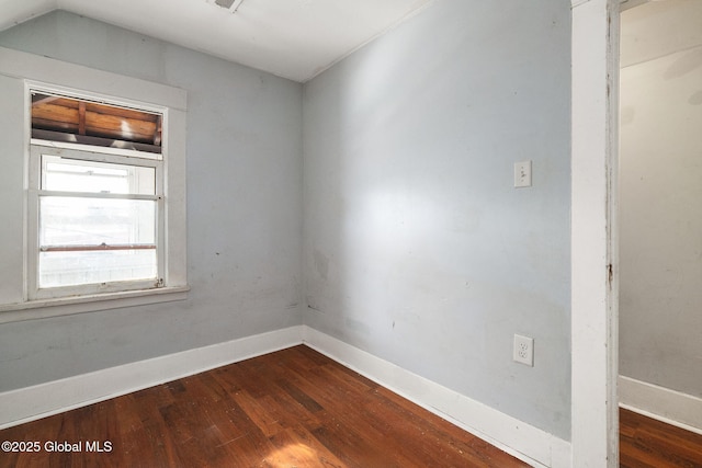 empty room featuring wood-type flooring