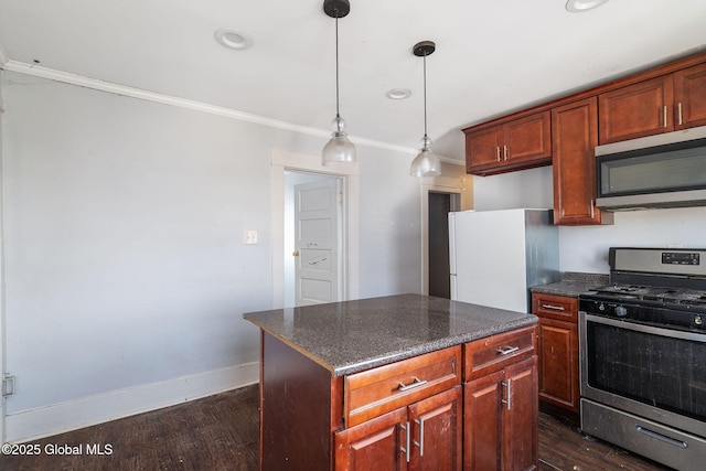 kitchen featuring a kitchen island, pendant lighting, stainless steel appliances, crown molding, and dark wood-type flooring