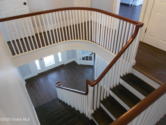 stairway with wood-type flooring