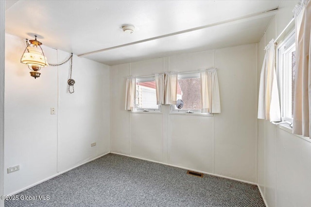 spare room with carpet flooring