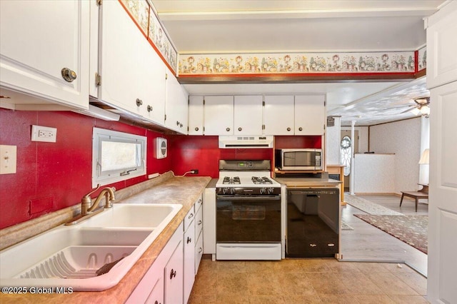 kitchen with white cabinetry, black dishwasher, sink, and white gas range oven