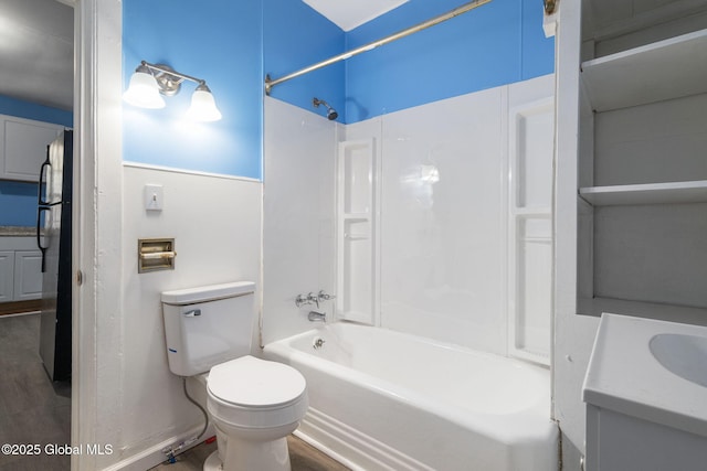 full bathroom featuring toilet, vanity, shower / bathtub combination, and hardwood / wood-style floors