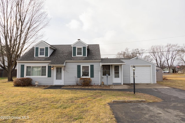 cape cod-style house with a front yard and a garage