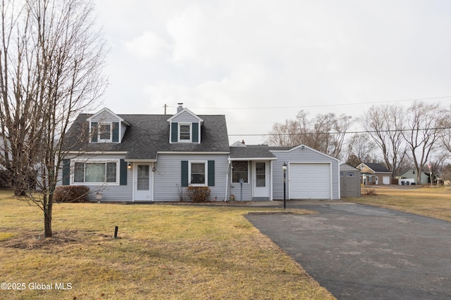 cape cod house with a front yard and a garage