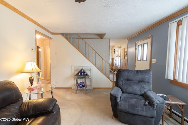 living room with baseboard heating, light carpet, a textured ceiling, and crown molding