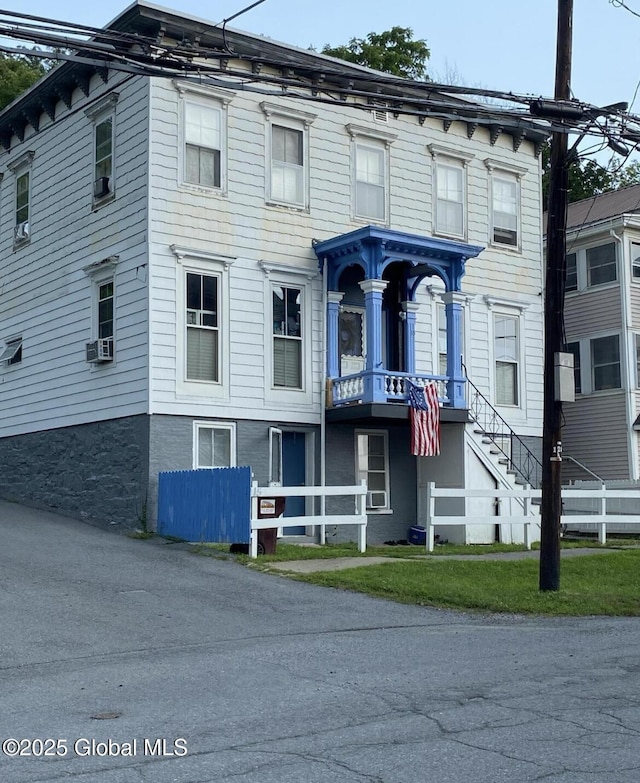 view of building exterior featuring cooling unit