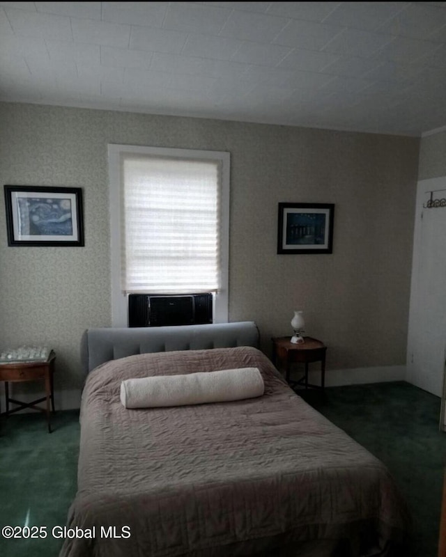 bedroom featuring dark carpet