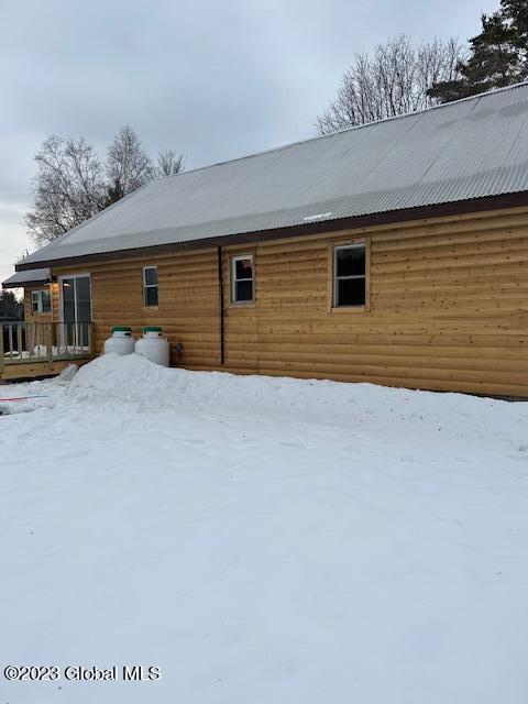 view of snow covered house