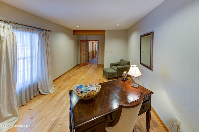 home office with light wood-type flooring