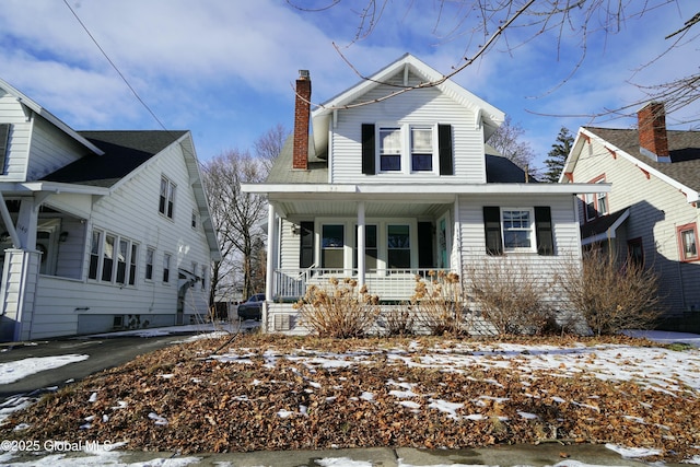 view of property with covered porch