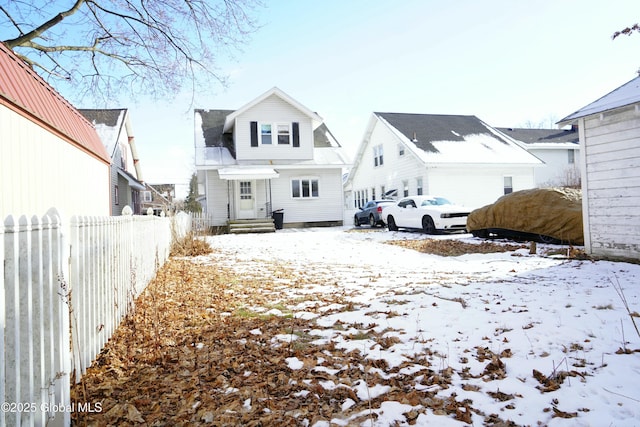 view of snow covered property