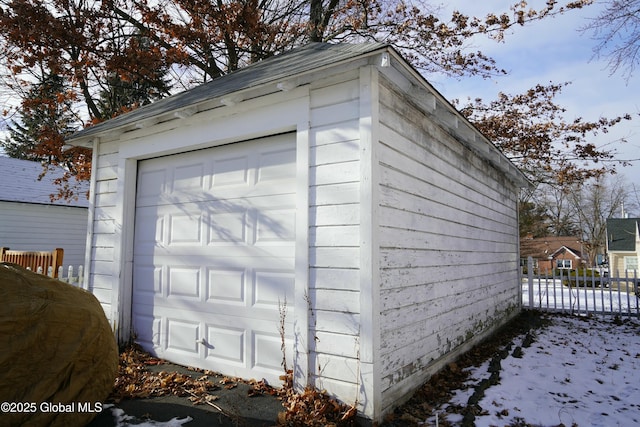 view of snow covered garage