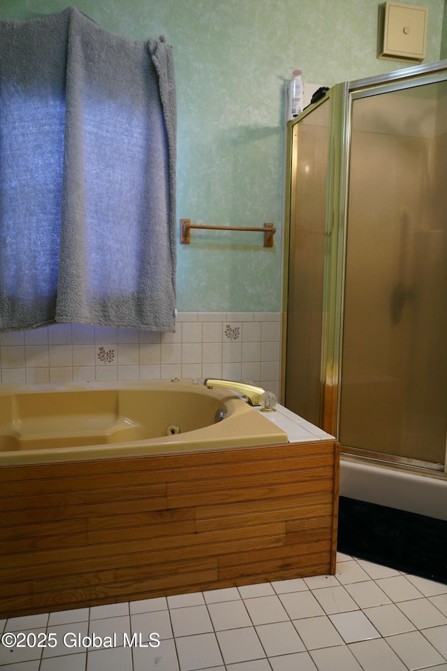 bathroom featuring independent shower and bath and tile patterned floors