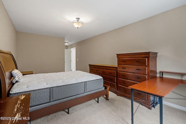 bedroom with light carpet