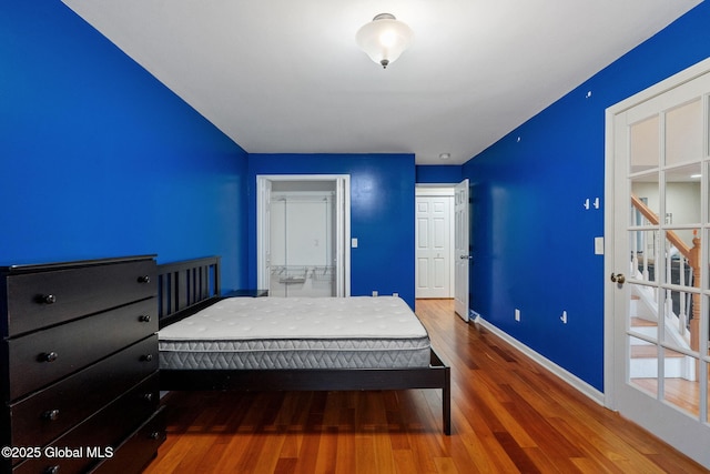 bedroom featuring hardwood / wood-style floors