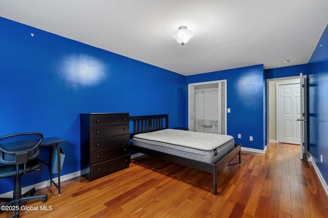 bedroom featuring hardwood / wood-style floors