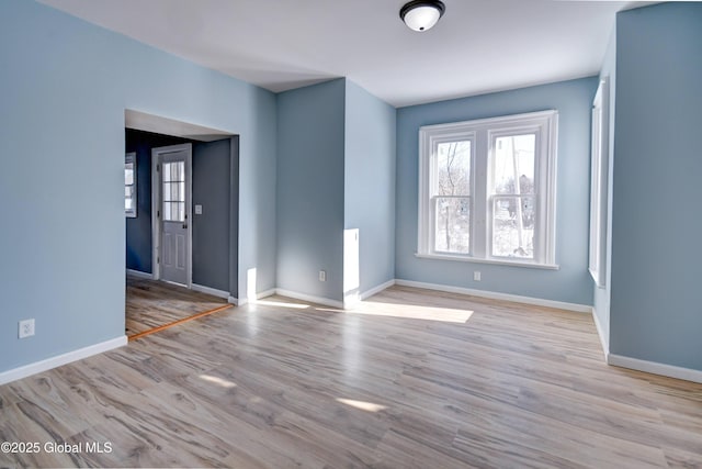 5 E Green St, Johnstown, NY 12095 - unfurnished room with baseboards and wood finished floors