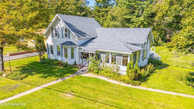 view of front of home with a front yard