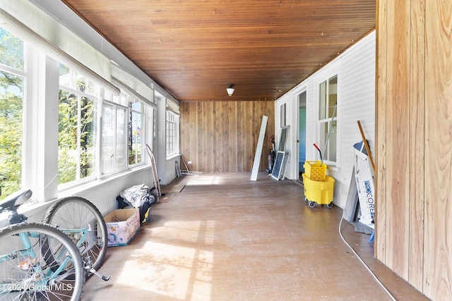 sunroom / solarium with wooden ceiling