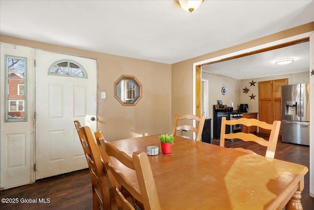 dining area with dark wood-type flooring