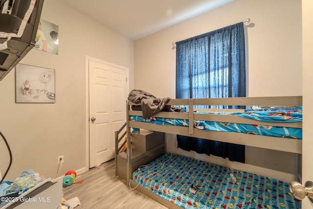 bedroom featuring light hardwood / wood-style flooring