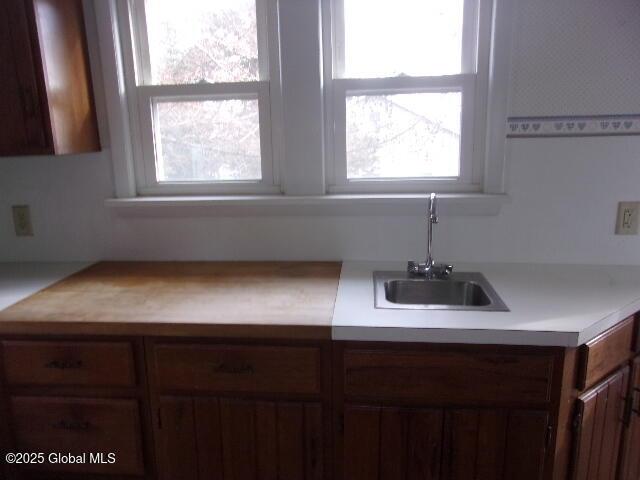 kitchen with sink and plenty of natural light