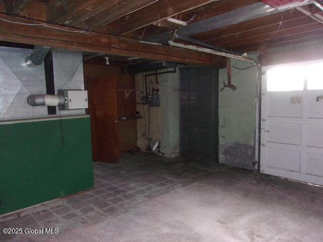 basement featuring heating unit