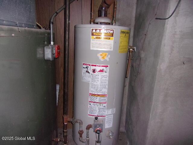 utilities with gas water heater and water heater