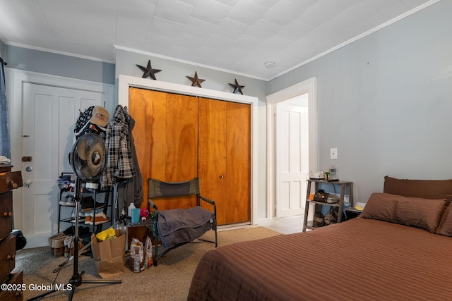 bedroom featuring light carpet, a closet, and crown molding