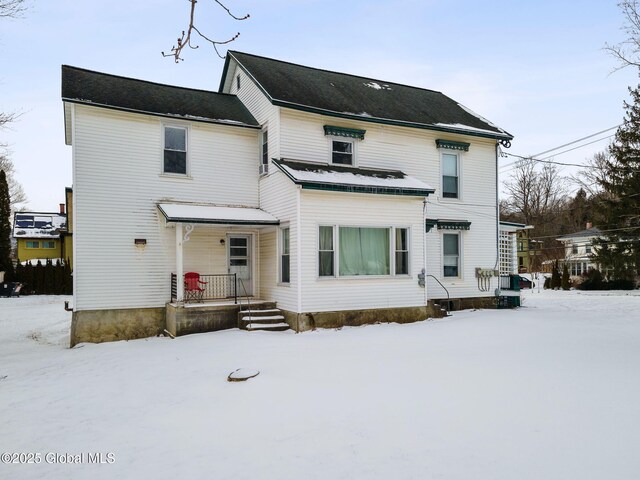 view of snow covered property