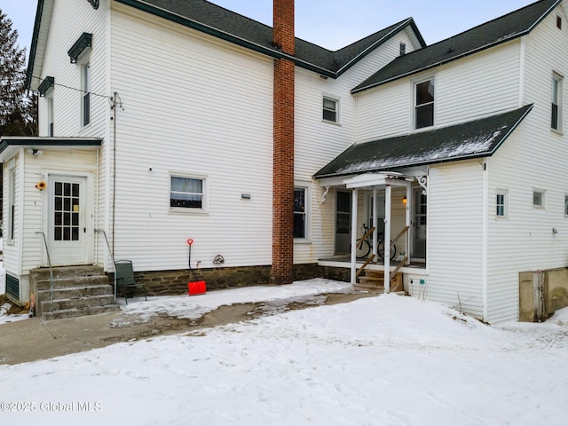 view of snow covered property