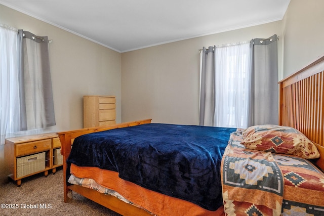 bedroom featuring carpet and crown molding