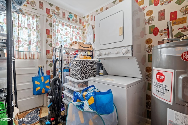 washroom with stacked washer / dryer, water heater, and crown molding