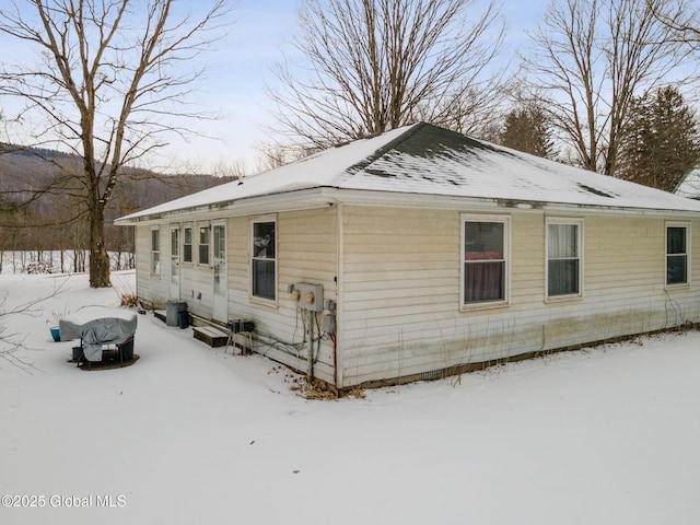 view of snow covered property