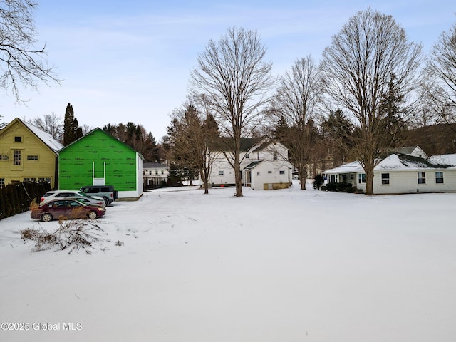 view of yard covered in snow