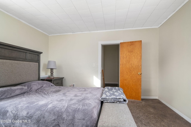 bedroom featuring carpet and crown molding