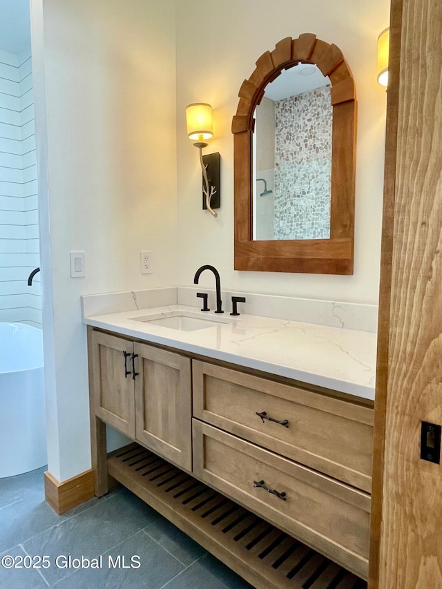 bathroom with vanity and tile patterned floors