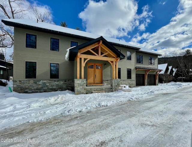 view of front of property featuring stone siding