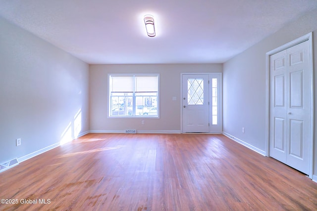 entryway featuring hardwood / wood-style flooring