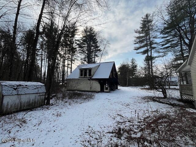 view of snow covered house