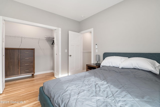 bedroom featuring a closet and hardwood / wood-style floors