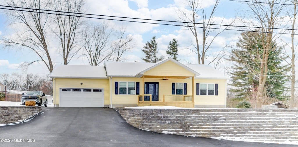 ranch-style house featuring a garage