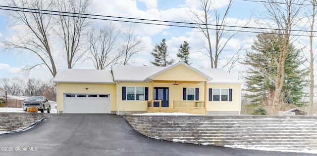 ranch-style house featuring a garage