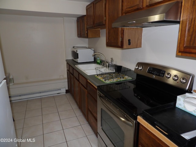 kitchen featuring sink, baseboard heating, stainless steel electric range oven, and light tile patterned flooring